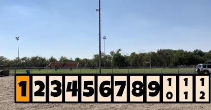 Football field with numbers 1 through 9 for parking spaces