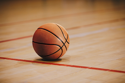 Basketball on the basketball court floor